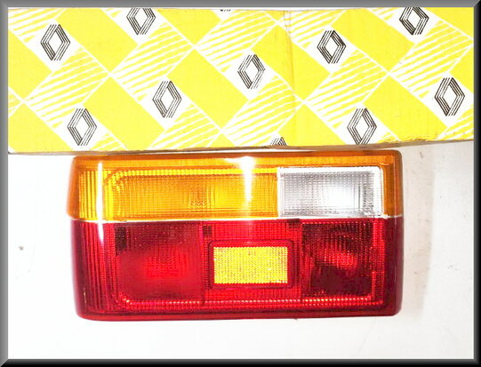 R9 Taillight cap on the left. (SEIMA 20910) (New Old Stock)