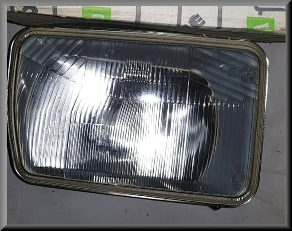 R14 Headlight left (New Old Stock).