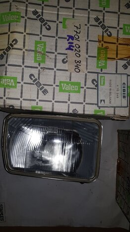 R14 Headlight left (New Old Stock).