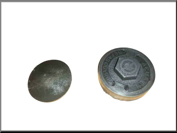 Radiateurdop (kunststof zwart) en pakking (rubber).